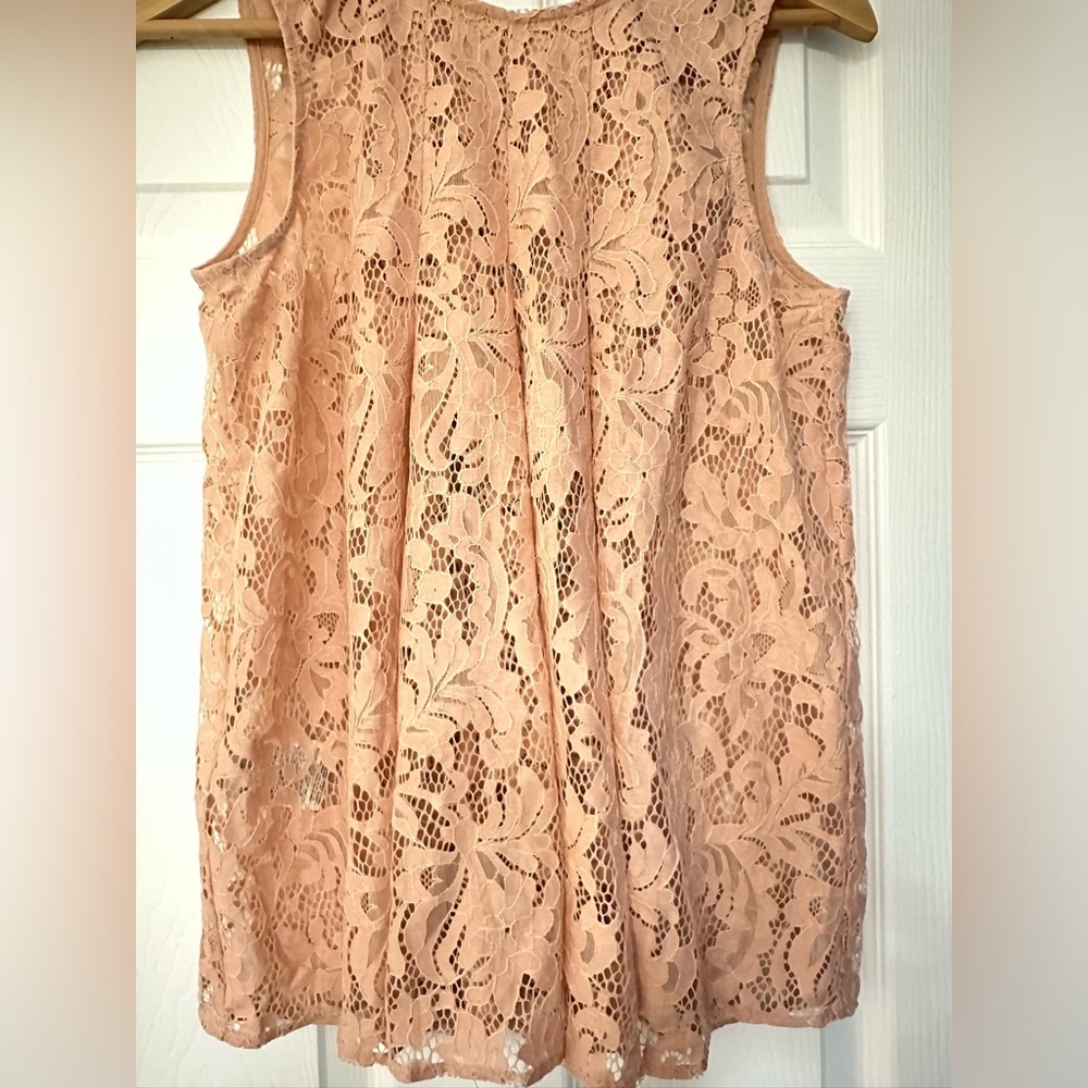 Lace sleeveless top - the fabric is rich quality lace material